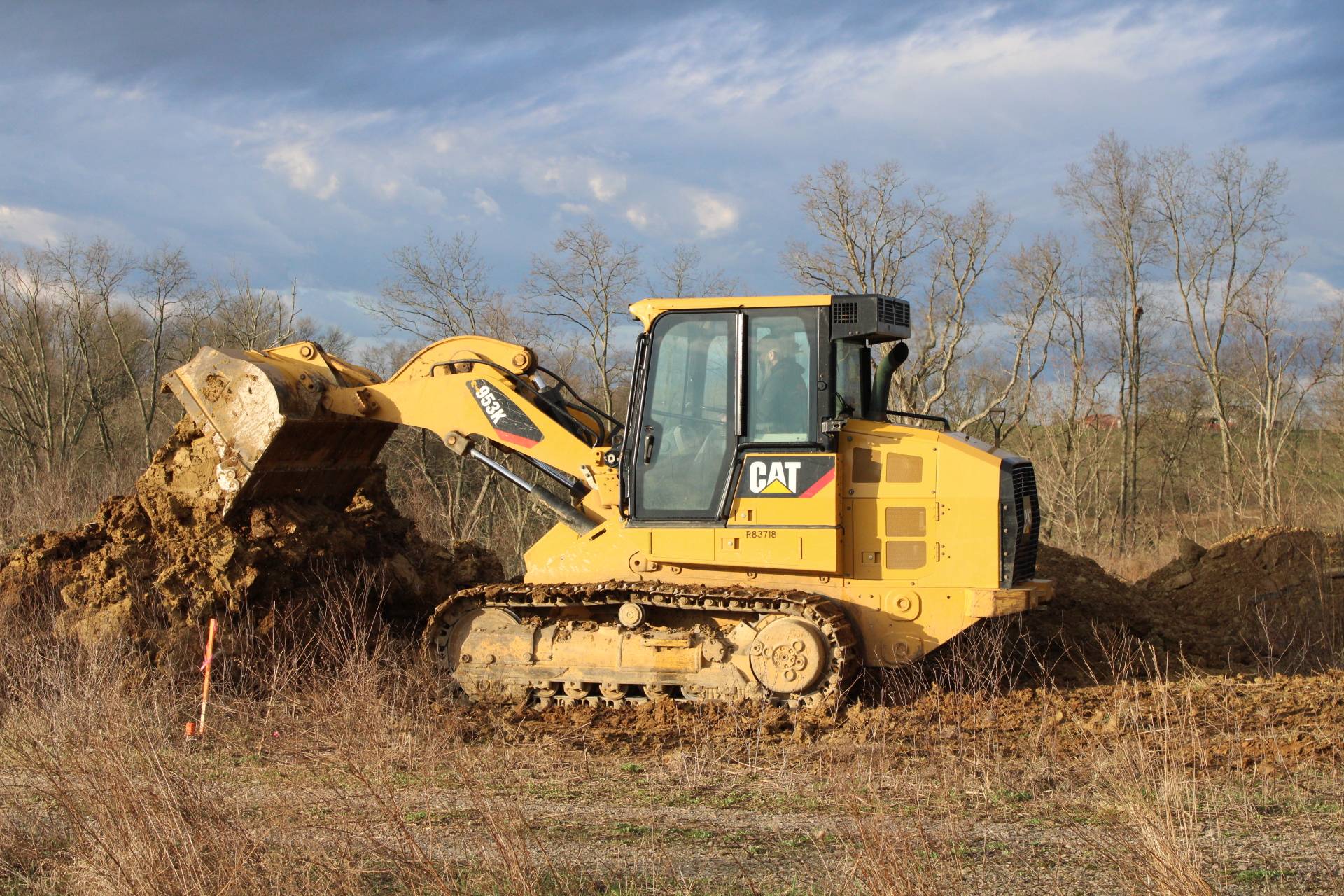 Solid Rock Excavating CAT 953K track loader working a Northern Kentucky site